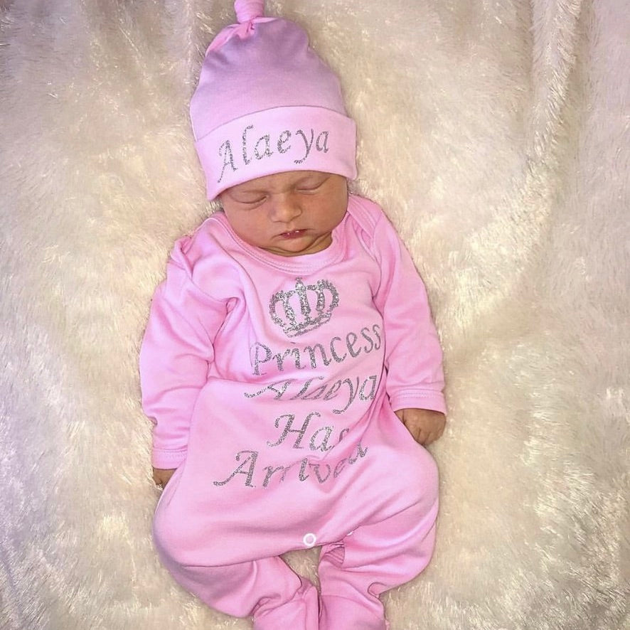 Personalised princess has arrived baby grow and hat set