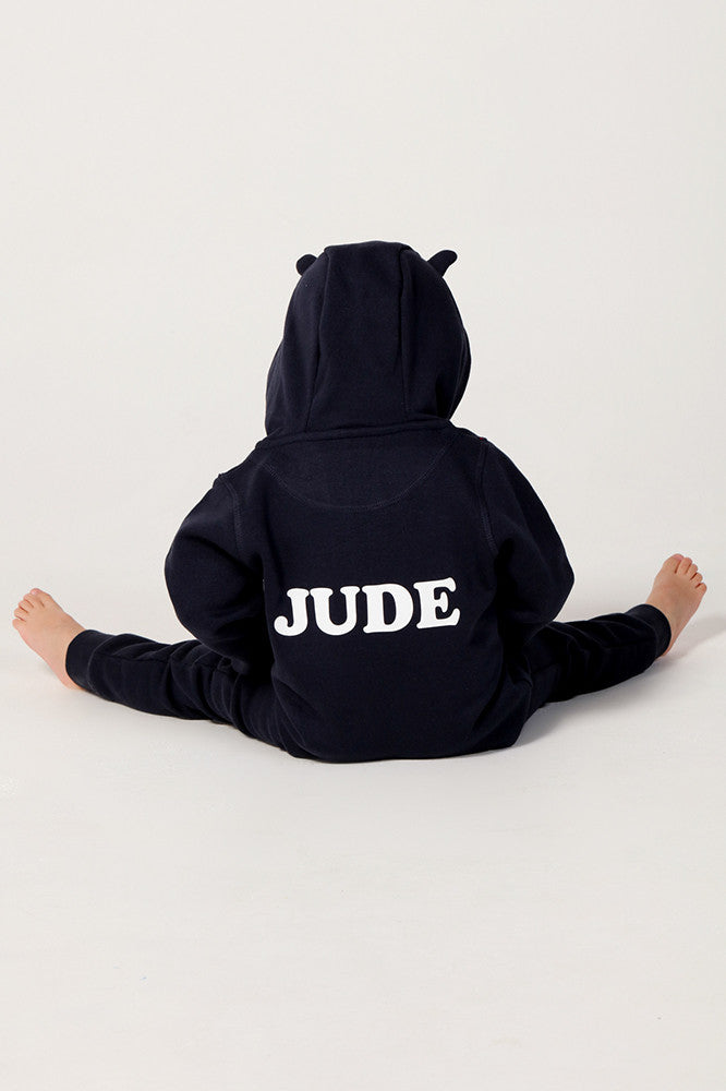 Personalised Luxury Black Baby Onesie Back View, Child sitting on the floor